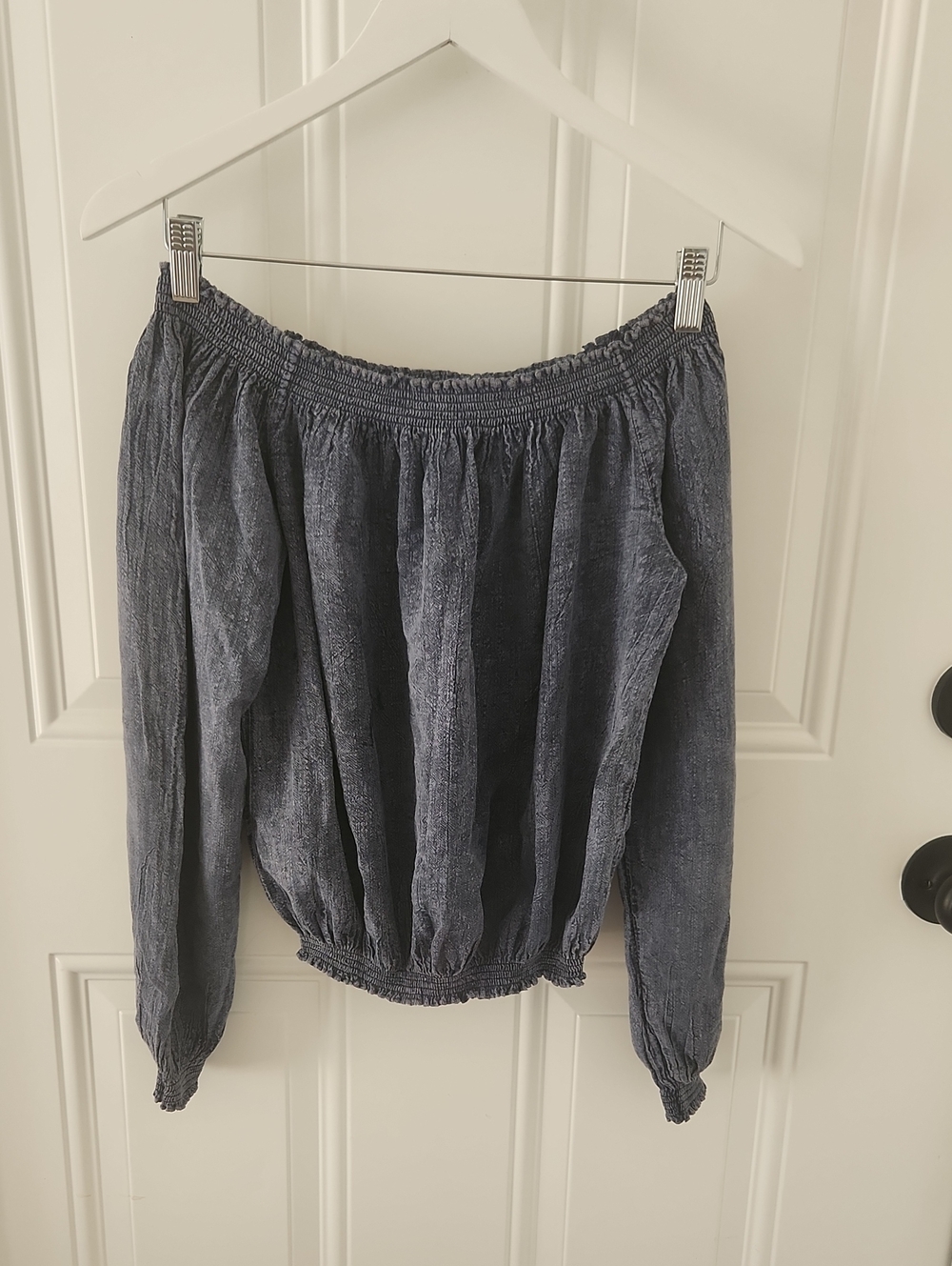 Washed Denim Elastic Smocked Boatneck Blouse.